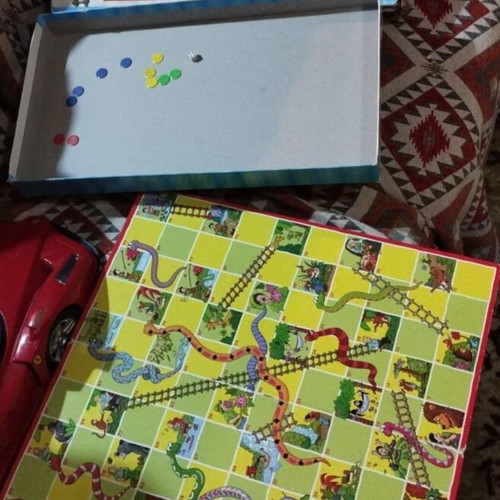 Snakes & Ladders and Ludo board games used, with worn box
