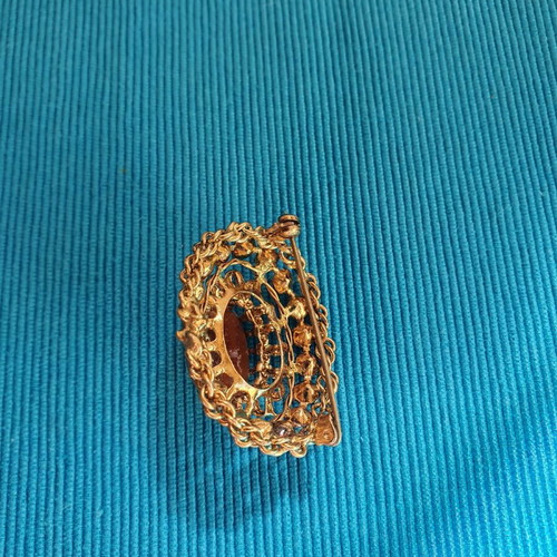 Vintage brooch used, gold color with crystals and cabochon