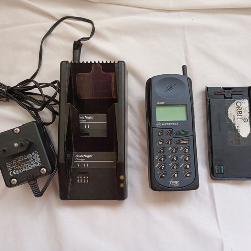 Motorola Flare GSM vintage mobile phone with charging base used