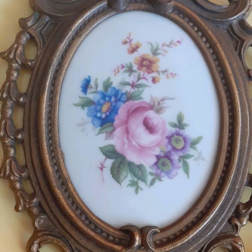 Porcelain miniatures like new with bronze border