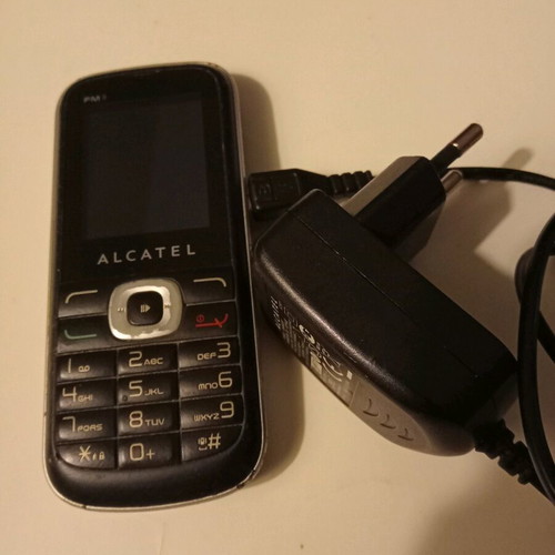 Alcatel 506D used mobile phone with charger, collectible, not working