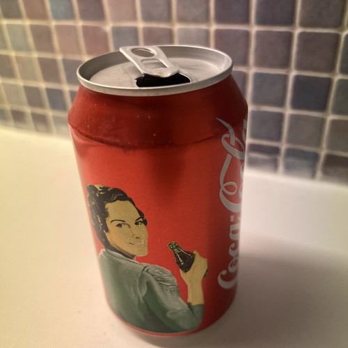 Coca Cola Woman collectible used, empty can