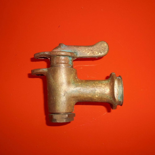 Old brass tap used with lock attachment option
