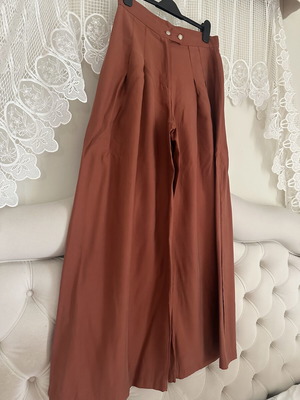 Vassia Kostara pants used, size large, terracotta color