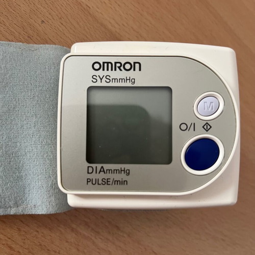 Omron digital wrist blood pressure monitor used