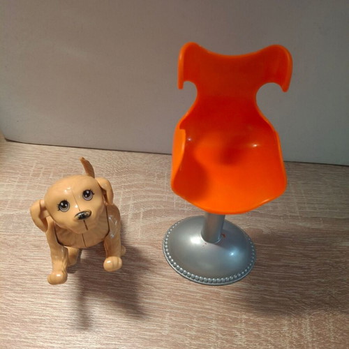 Barbie chair and dog used