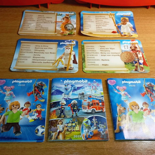 Playmobil cases used with cards and brochures