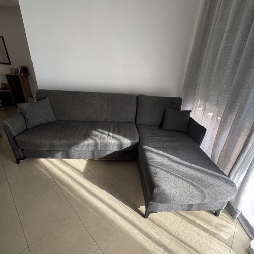 Corner sofa bed gray with storage, used
