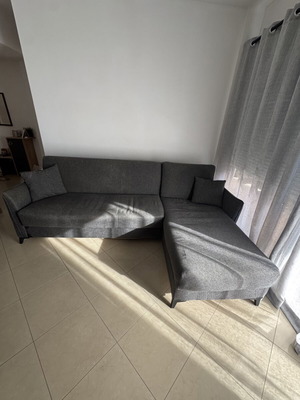 Corner sofa bed gray with storage, used