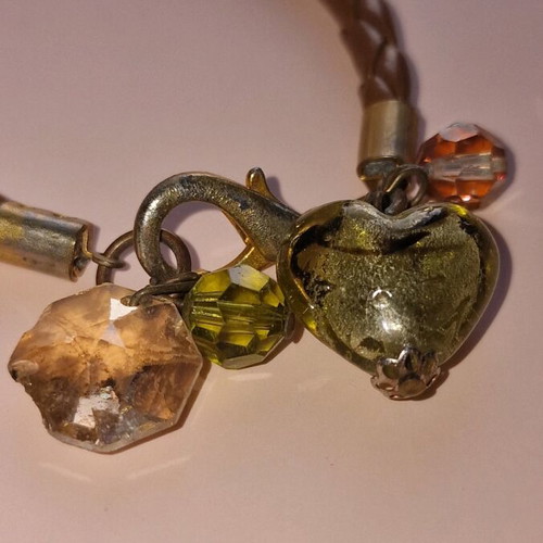 Bracelet in taupe with green stones like new