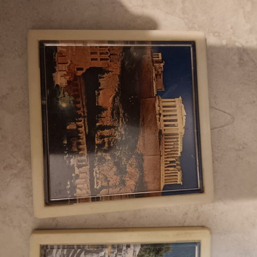 Very small art prints used, coaster size