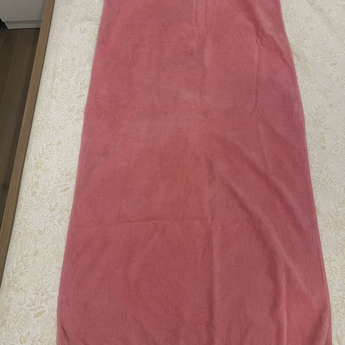 Beach towel used, coral color