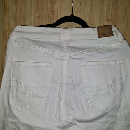 American Eagle white jeans like new, size L with asymmetric hem