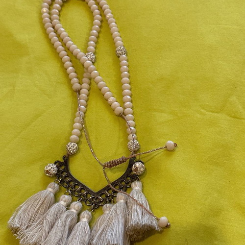 Long necklace used handmade beige with tassels