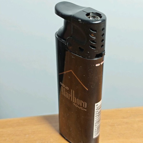 Marlboro collectible windproof lighter used, functional