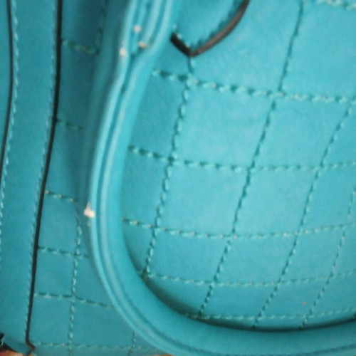 Bag with long strap with small signs of wear