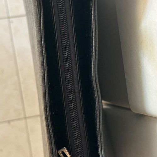 Black shoulder bag used with surface scratch