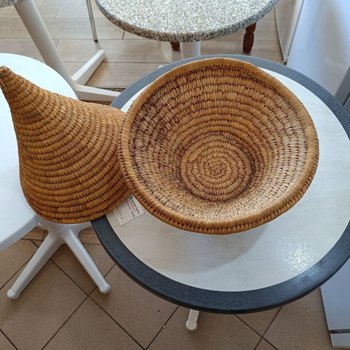 Handmade woven basket with conical lid used, natural fibers