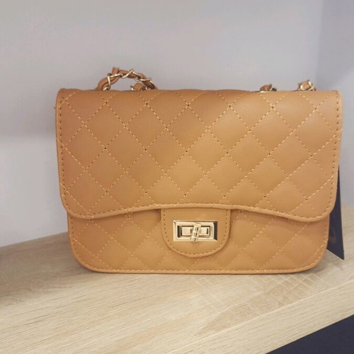 Shoulder bag new with gold details orange
