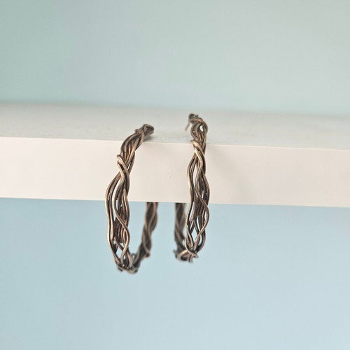 Woven hoop earrings used, bronze by Anna Maria Mazaraki
