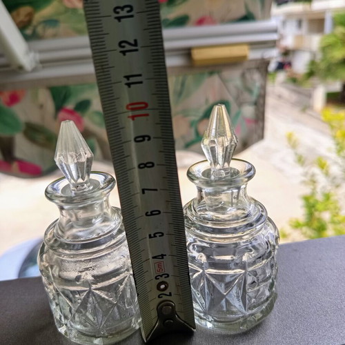Vintage glass miniature bottle set of 2 with carved pattern and glass stopper