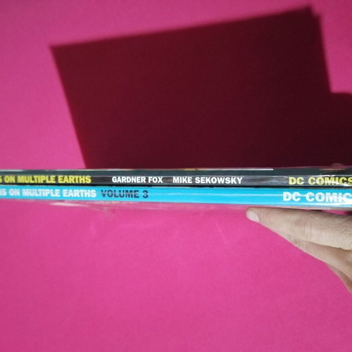 Crisis On Multiple Earths comic volumes 1 and 3 like new