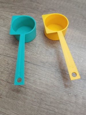 Tapperware plastic measuring cups new for precise measurement
