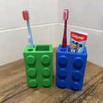 Toothpaste and toothbrush stand like new