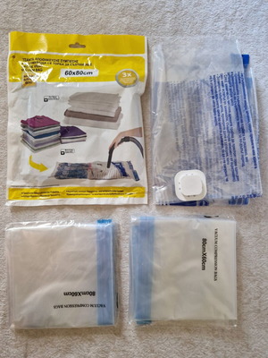 Storage bags set of 4, new, vacuum use