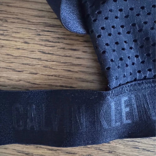 Calvin Klein swimwear top, size small, black