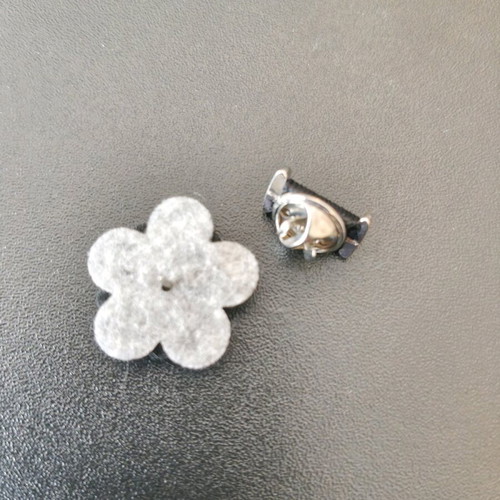 Set of two men's lapel pins like new, black and silver