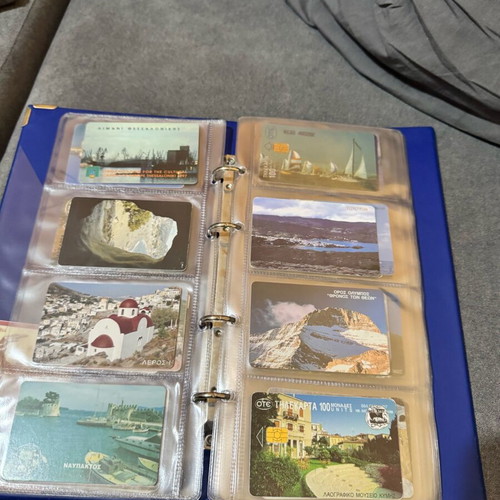 Album with 50 various phone cards like new