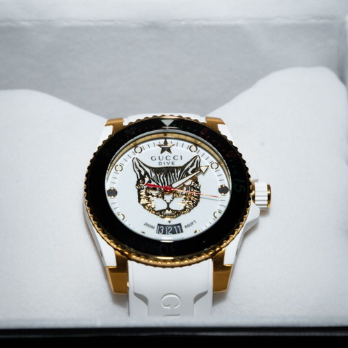 Gucci Dive YA136322 watch like new, unisex, white and gold
