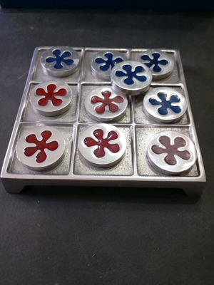 Tic Tac Toe used aluminum game with extra pieces for play or decoration