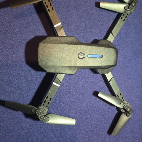Drone new with 3 batteries, case and spare propellers