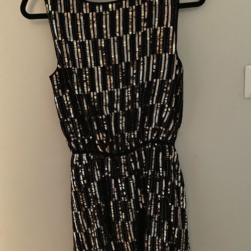 Dress with sequins and open back new by Celestino, black and gold