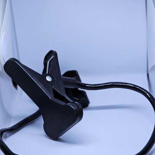 Mobile phone holder with clip and flexible arm used