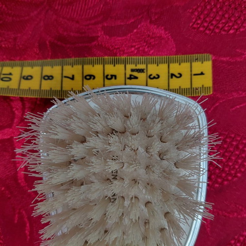 Vintage boudoir clothes brush from the 1970s, used
