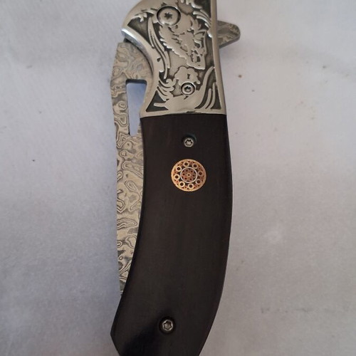 Folding knife from Damascus steel new