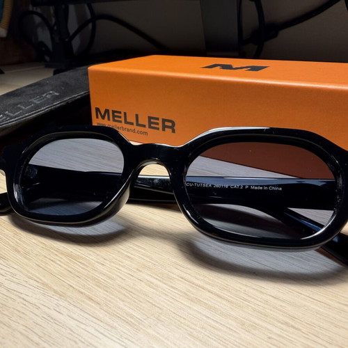 Meller Cumbi unisex sunglasses black with blue polarized lenses