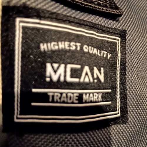 Mcan backpack bag gray with orange details like new