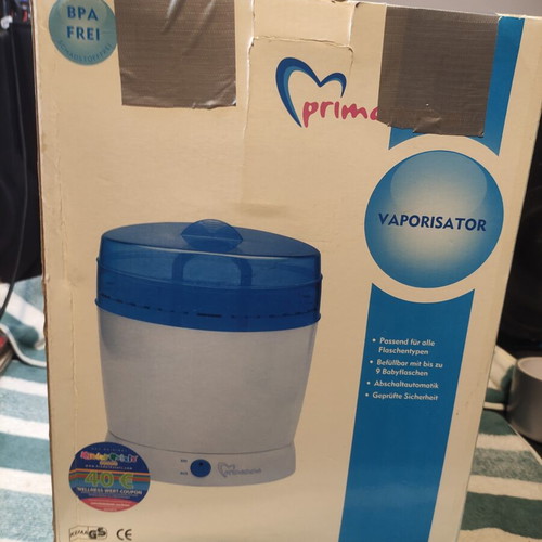 Primamma electric steam sterilizer used, capacity for 9 bottles
