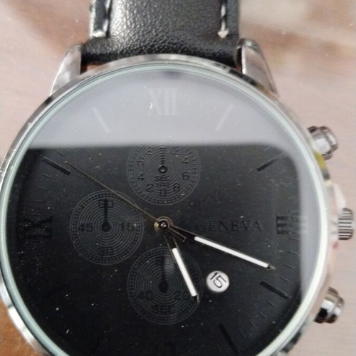 Geneva wristwatch with date, quartz mechanism, black