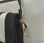 Shoulder bag with adjustable strap, black and red