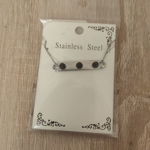 Stainless steel necklace new with plate and 3 black beads