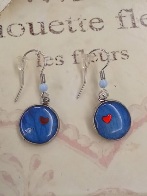 Earrings with blue rose petal in resin new