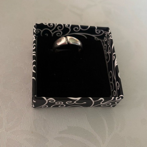 Silver ring with small stones used