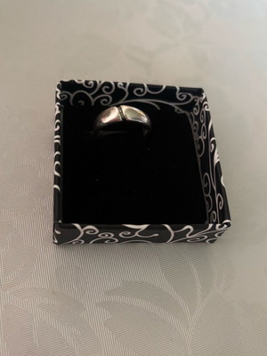 Silver ring with small stones used