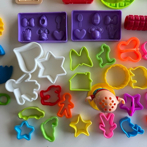 Play Doh Care and Carry Vet Playset used with modeling accessories