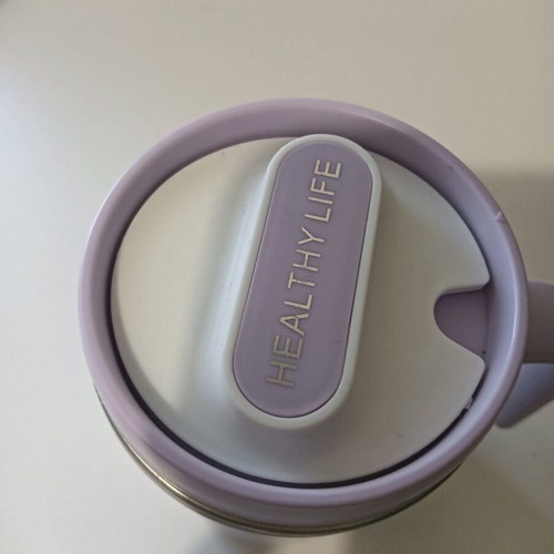 Thermos mug in lilac color like new